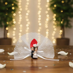 Hochzeitsfigur Brautpaar – Elegantes Hochzeitssouvenir mit Tüll